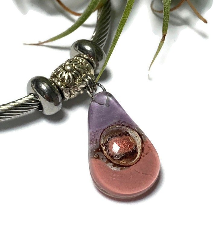 Pink, Copper and Brown Stainless Steel Bracelet Glass Charm Bead. Easy to put on adjustable stretch memory wire. One size fits most