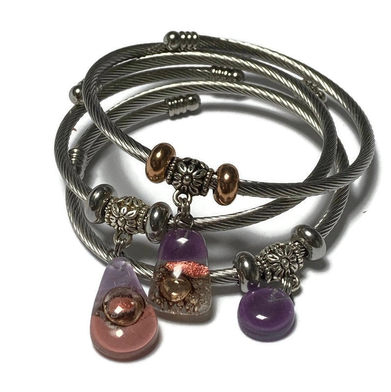 Pink, Copper and Brown Stainless Steel Bracelet Glass Charm Bead. Easy to put on adjustable stretch memory wire. One size fits most