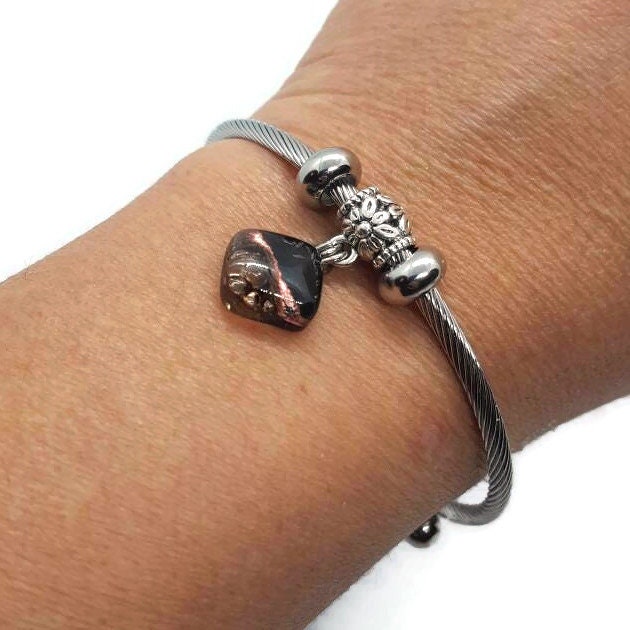 Black, Copper and Brown Stainless Steel Bracelet Glass Charm Bead. Easy to put on adjustable stretch memory wire. One size fits most