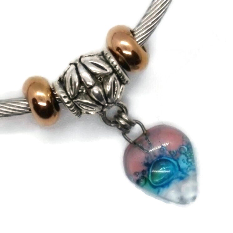 Pink White and Turquoise Elastic Cable Bangle Twisted Stainless Steel Bracelet. Easy to put on stretch memory wire. One size fits most