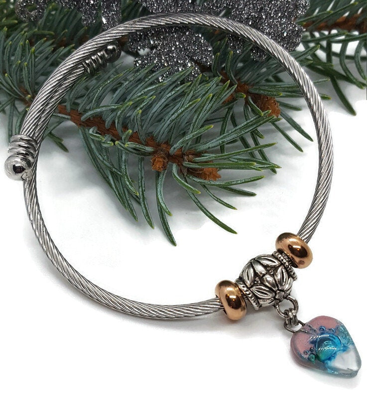Pink White and Turquoise Elastic Cable Bangle Twisted Stainless Steel Bracelet. Easy to put on stretch memory wire. One size fits most