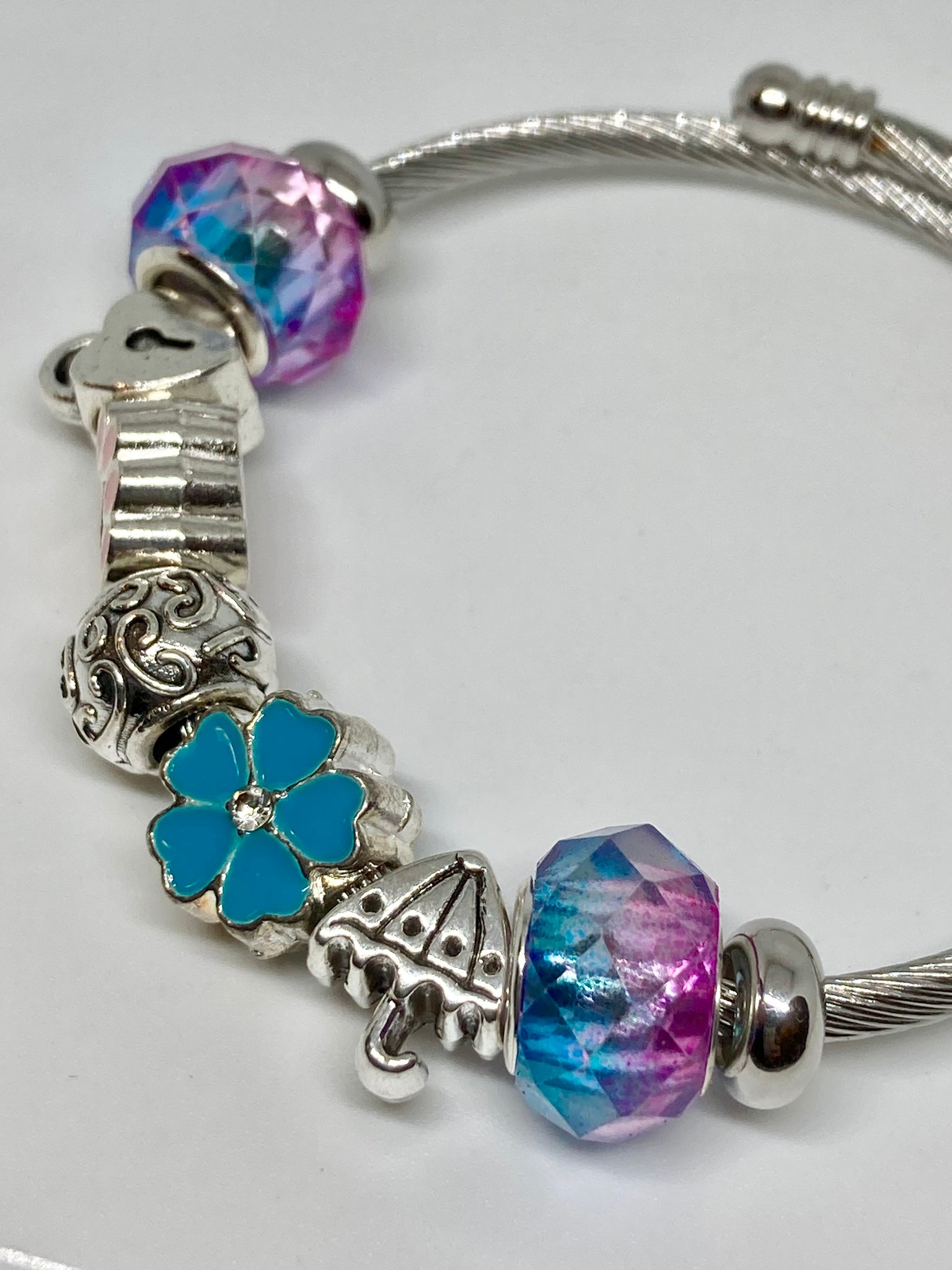 Brenda Blue Purple and pink Stainless Expandable Easy to put on stretch memory wire Charm Bracelet. One size fits most