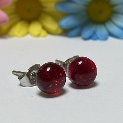 Transparent cerise Glass studs