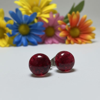 Transparent cerise Glass studs
