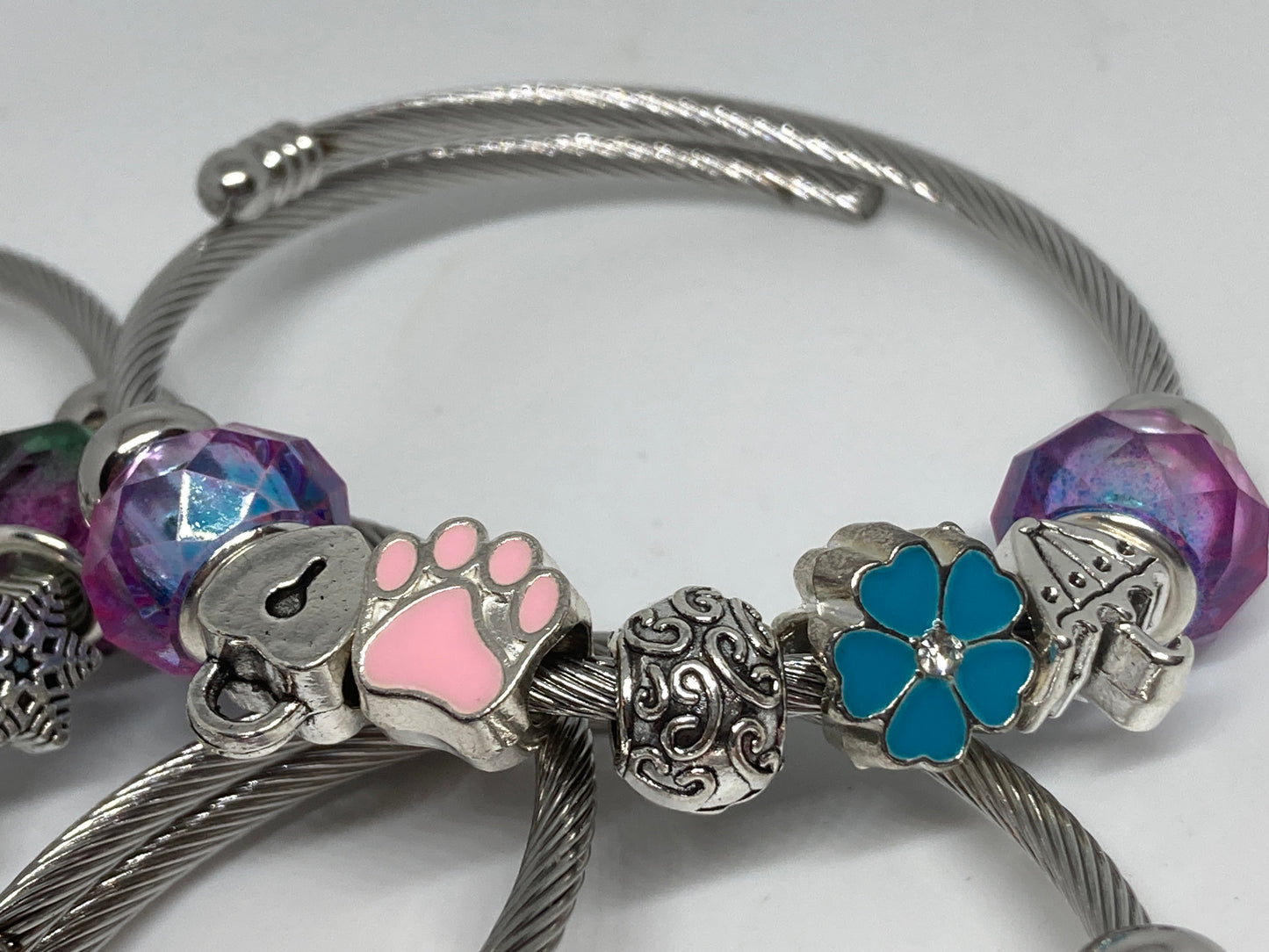 Brenda Blue Purple and pink Stainless Expandable Easy to put on stretch memory wire Charm Bracelet. One size fits most