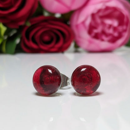 Transparent cerise Glass studs