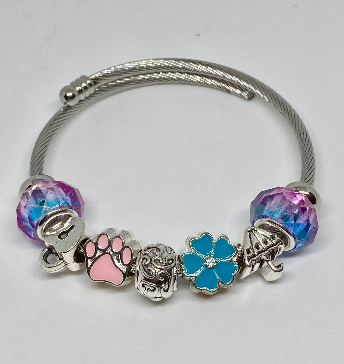 Brenda Blue Purple and pink Stainless Expandable Easy to put on stretch memory wire Charm Bracelet. One size fits most