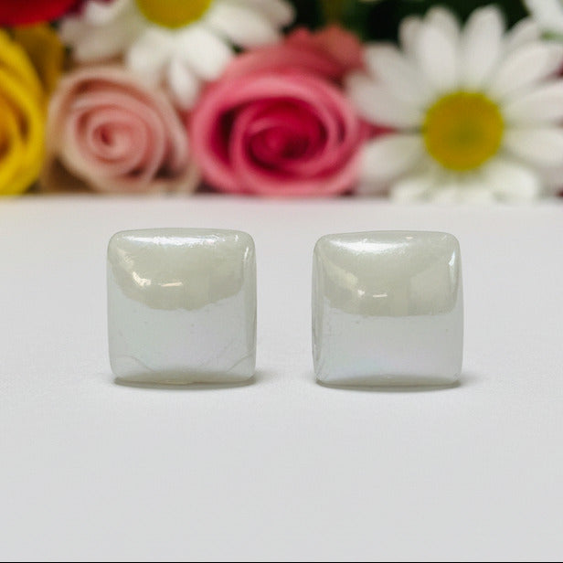 Pair of 8mm handmade square geometric stud earrings crafted from classic pearl white recycled glass pearlized tiles with hypoallergenic stainless steel posts.