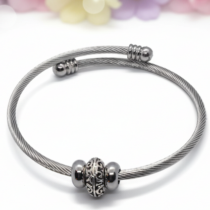 Elegant Elastic Cable Bangle Twisted Stainless Steel Bracelet. Easy to put on adjustable stretch memory wire. One size fits most