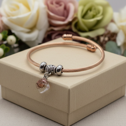 Pink, Brown and white golden Stainless Steel Bracelet Glass Charm Bead. Easy to put on adjustable stretch memory wire. One size fits most