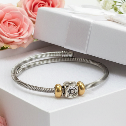 Flower Stainless Steel Bracelet Glass Charm Bead. Easy to put on adjustable stretch memory wire. One size fits most