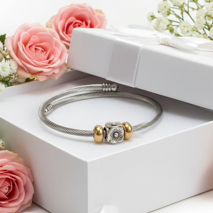 Flower Stainless Steel Bracelet Glass Charm Bead. Easy to put on adjustable stretch memory wire. One size fits most