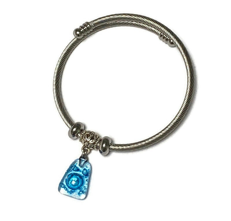 Turquoise with bubbles Stainless Steel Bracelet Glass Charm Bead. Easy to put on adjustable stretch memory wire. One size fits most