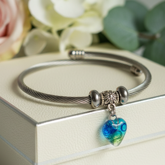 Green and Blue glass bead Stainless Steel Bracelet Glass Charm Bead. Easy to put on adjustable stretch memory wire. One size fits most