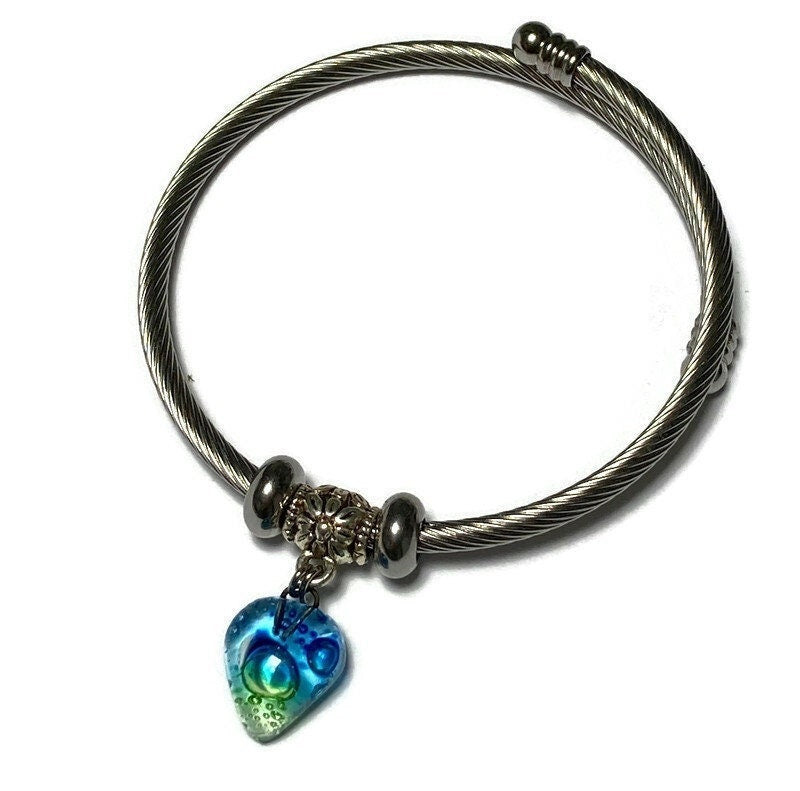 Green and Blue glass bead Stainless Steel Bracelet Glass Charm Bead. Easy to put on adjustable stretch memory wire. One size fits most