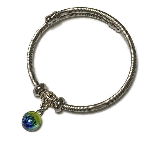 Green and blue Stainless Steel Bracelet Glass Charm Bead. Easy to put on adjustable stretch memory wire. One size fits most. Elastic