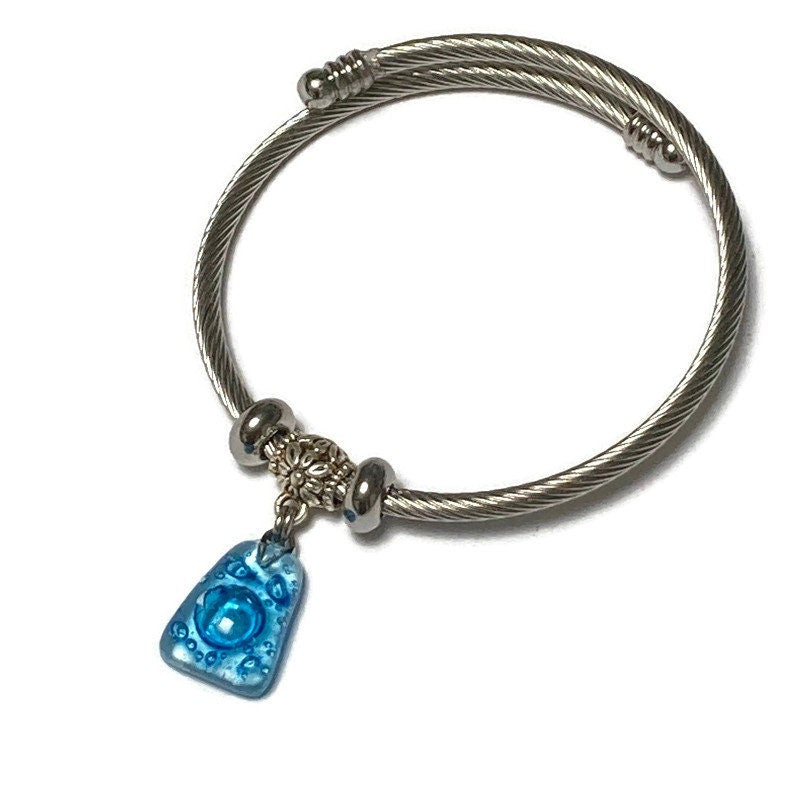 Turquoise with bubbles Stainless Steel Bracelet Glass Charm Bead. Easy to put on adjustable stretch memory wire. One size fits most