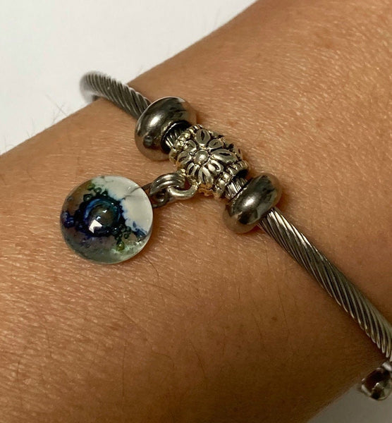 Dark Blue, Green and White Stainless Steel Bracelet Glass Charm Bead. Easy to put on adjustable stretch memory wire. One size fits most