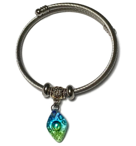 Turquoise, green and blue Stainless Steel Bracelet Glass Charm Bead. Easy to put on adjustable stretch memory wire. One size fits most.