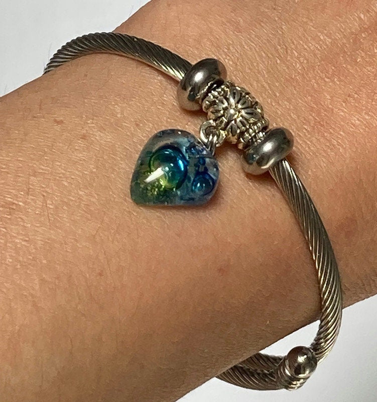 Green and Blue glass bead Stainless Steel Bracelet Glass Charm Bead. Easy to put on adjustable stretch memory wire. One size fits most