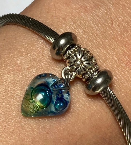 Green and Blue glass bead Stainless Steel Bracelet Glass Charm Bead. Easy to put on adjustable stretch memory wire. One size fits most