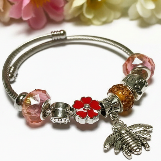 Pink, red and orange. Stainless Expandable Easy to put on stretch memory wire Charm Bracelet. One size fits most