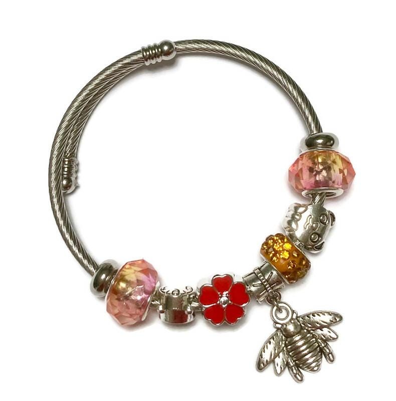 Pink, red and orange. Stainless Expandable Easy to put on stretch memory wire Charm Bracelet. One size fits most