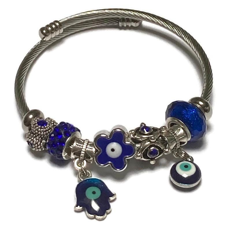 Awesome Blue Evil eye Stainless Expandable Easy to put on stretch memory wire Charm Bracelet. One size fits most