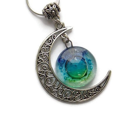 Blue moon, Green blue moon recycled glass long pendant. Handmade.