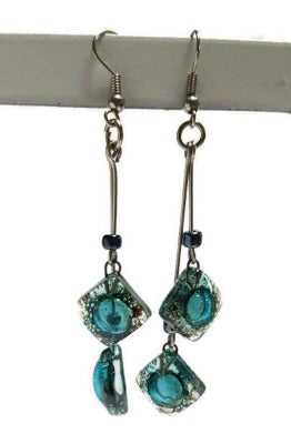 Long multiple bead brown and blue teal earrings. Bubbles