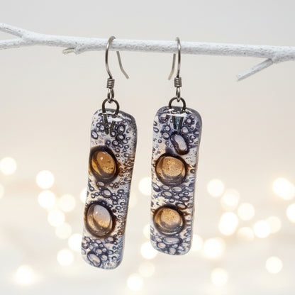 Clear lilac and Brown bars... Lots of  bubbles. Recycled Fused Glass Dangling earrings