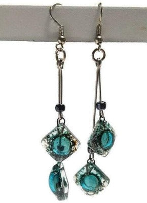 Long multiple bead brown and blue teal earrings. Bubbles