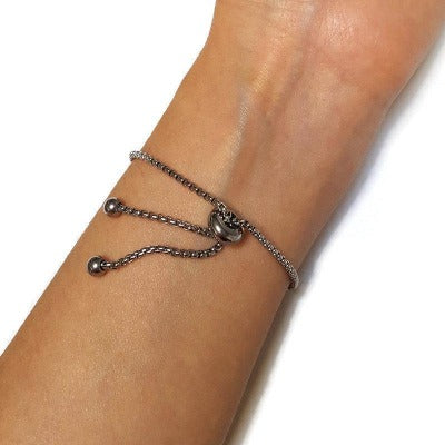 Black and Copper Minimalist, Dainty, Adjustable slider bracelet with recycled glass charm. Stainless Steel Box Chain Slider Bracelet.