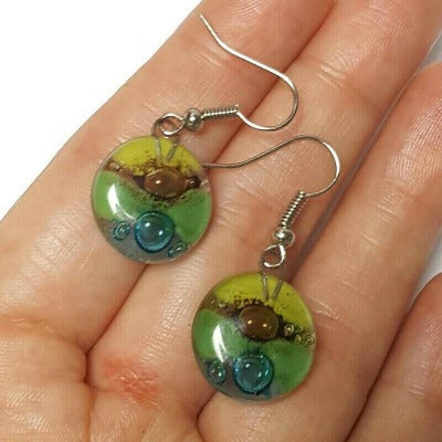 Green, brown, and turquoise round dangle Fused Glass Drop Earrings. Fun colors. Everyday earrings. Handcrafted beads and charms