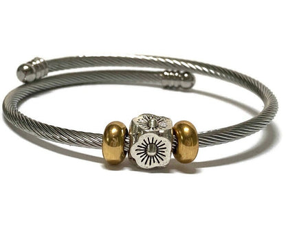 Flower Stainless Steel Bracelet Glass Charm Bead. Easy to put on adjustable stretch memory wire. One size fits most