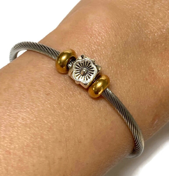 Flower Stainless Steel Bracelet Glass Charm Bead. Easy to put on adjustable stretch memory wire. One size fits most