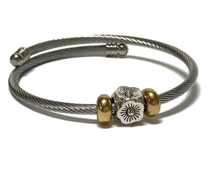 Flower Stainless Steel Bracelet Glass Charm Bead. Easy to put on adjustable stretch memory wire. One size fits most
