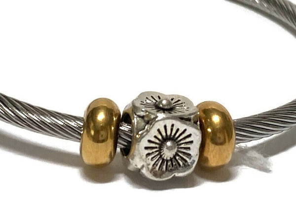 Flower Stainless Steel Bracelet Glass Charm Bead. Easy to put on adjustable stretch memory wire. One size fits most