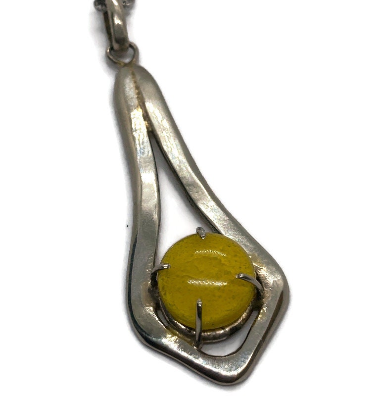 Yellow Recycled fused glass unique handcrafted pendant .